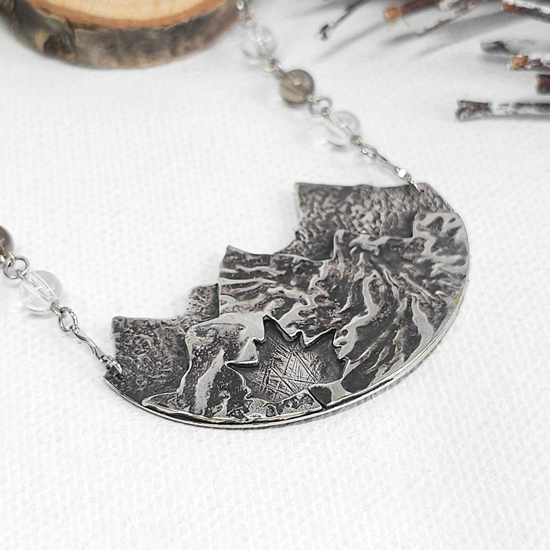 reticulation silver necklace with nature-themed vancouver canada inspired pendant